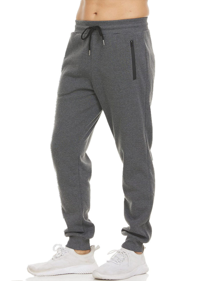 Women's nan tapered jogging pants with elastic comfort waistband, water-repellent zip pocket and ribbed ankle cuffs Mune Fashion