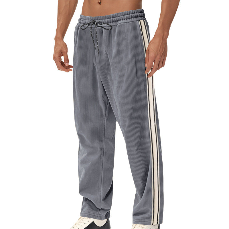 Men's loose training pants in corduroy look with drawstring waistband and side contrast stripes Mune Fashion