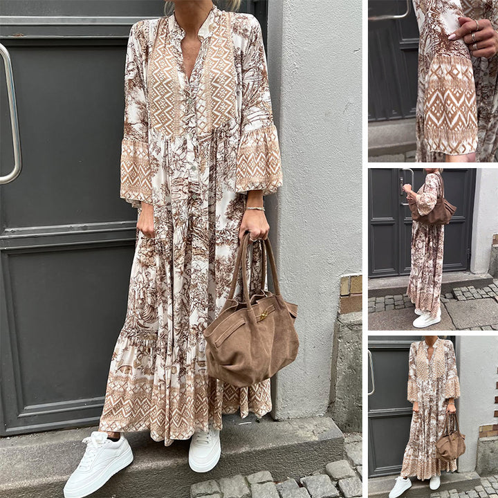 Ladies' tiered maxi dress with ethnic border, stand-up collar, and wide bell sleeves Mune Fashion