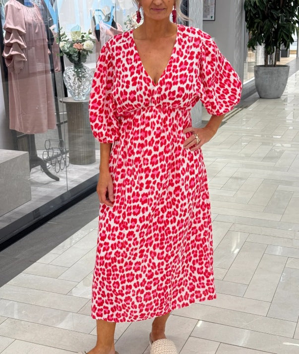 Women's maxi dress with deep V-neck, voluminous puff sleeves, and smocked waist seam Mune Fashion