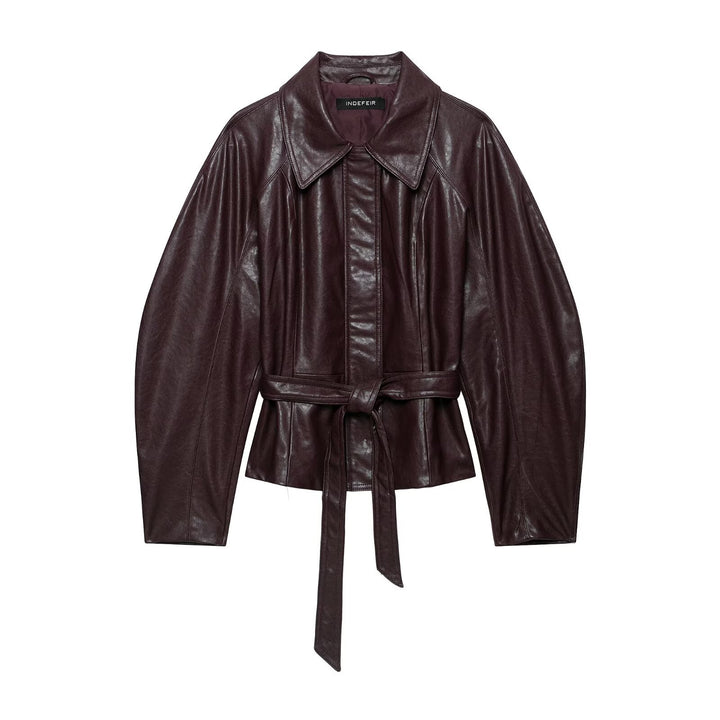 Women's short jacket made of vegan leather with a waist tie belt and dropped raglan sleeve construction Mune Fashion