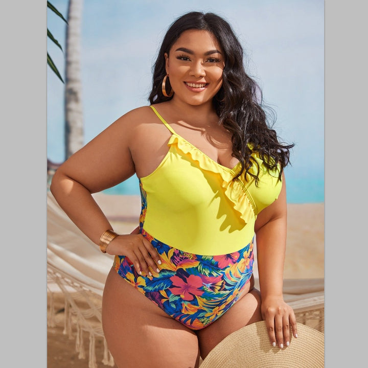 Women's one-piece swimsuit with asymmetrical ruffle design and floral pant area Mune Fashion