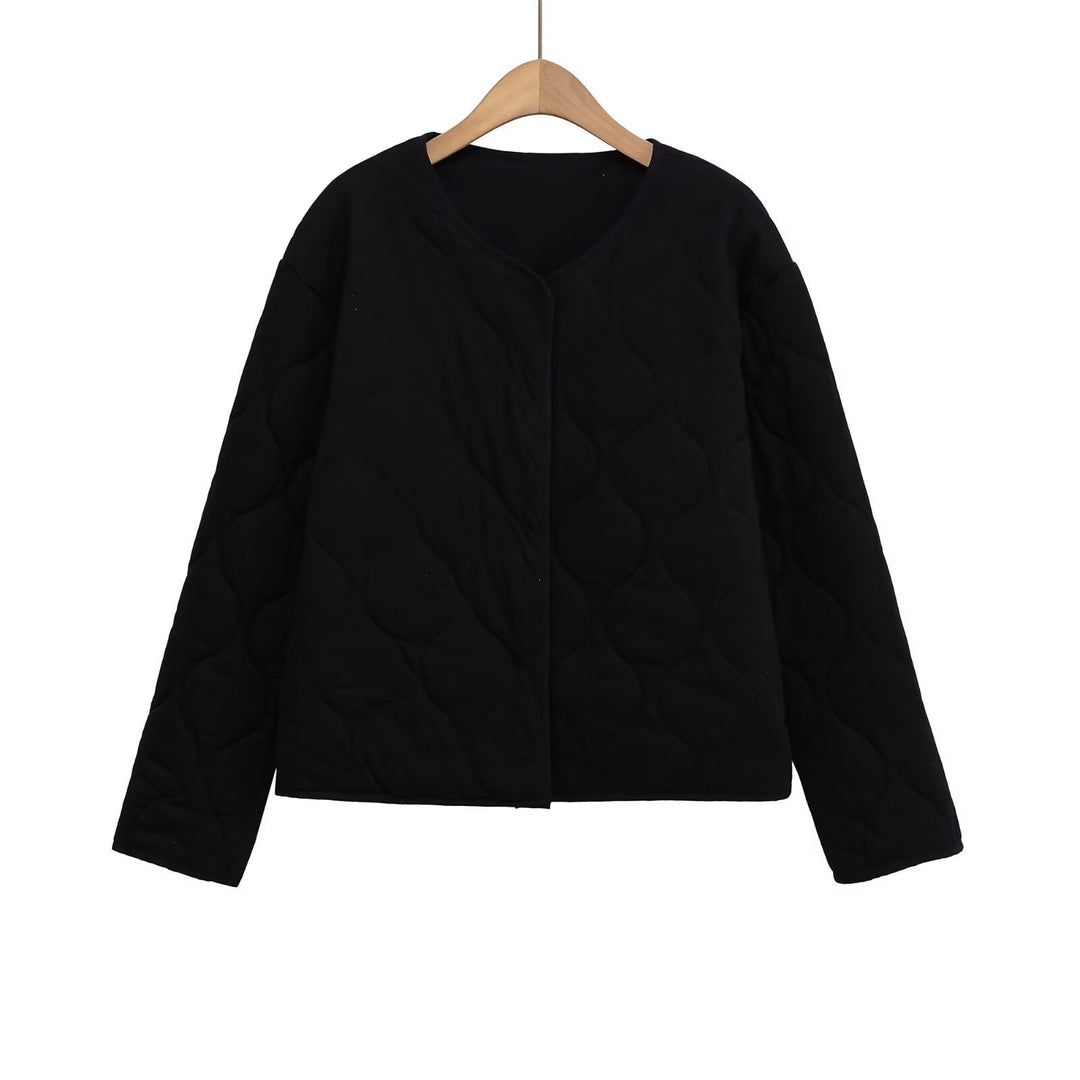 Women's quilted jacket without a collar with a boxy silhouette and tonal wave quilting Mune Fashion