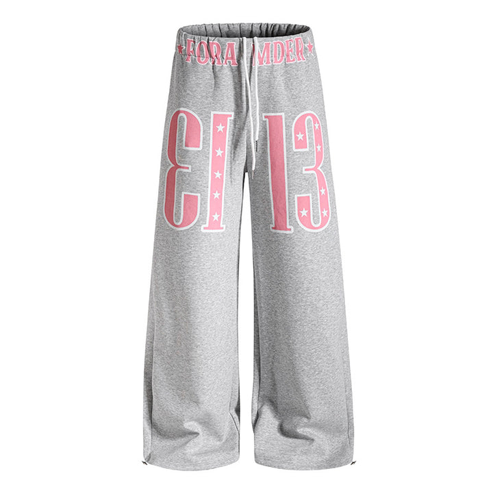 Women's Wide Palazzo Jogging Pants with High Comfort Waistband, Drawstring and Large Graphic Front Mune Fashion