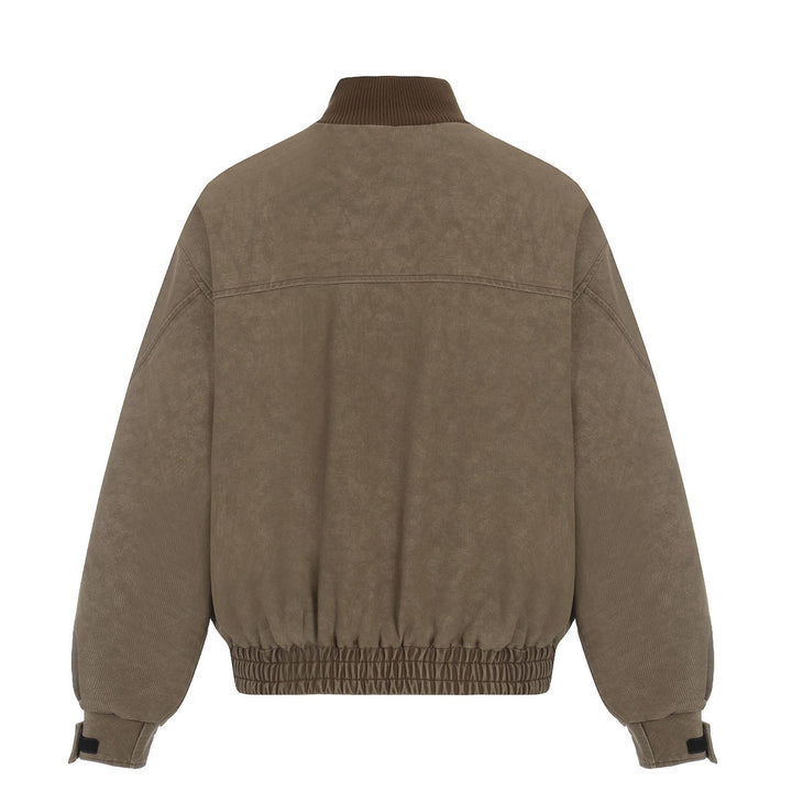 Men's short boxy blouson made of corduroy fabric with high ribbed collar and elastic hem.