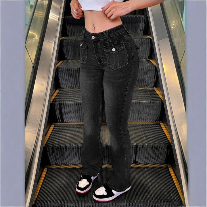Women's High-Waisted Stretch Jeans with Light Flare and Decorative Pockets Mune Fashion