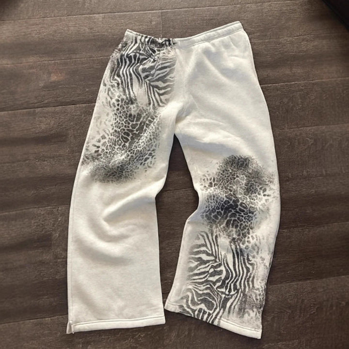Women nan loose sweatpants with asymmetrical animal print, elastic comfort waistband and straight leg Mune Fashion