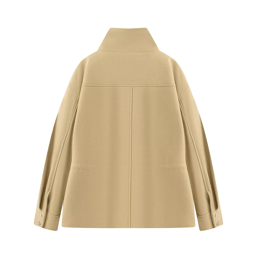 Women's fitted parka jacket with high stand-up collar, drawstring waist and applied flap pockets Mune Fashion