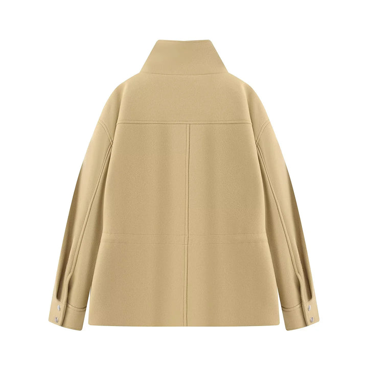 Women's fitted parka jacket with high stand-up collar, drawstring waist and applied flap pockets Mune Fashion