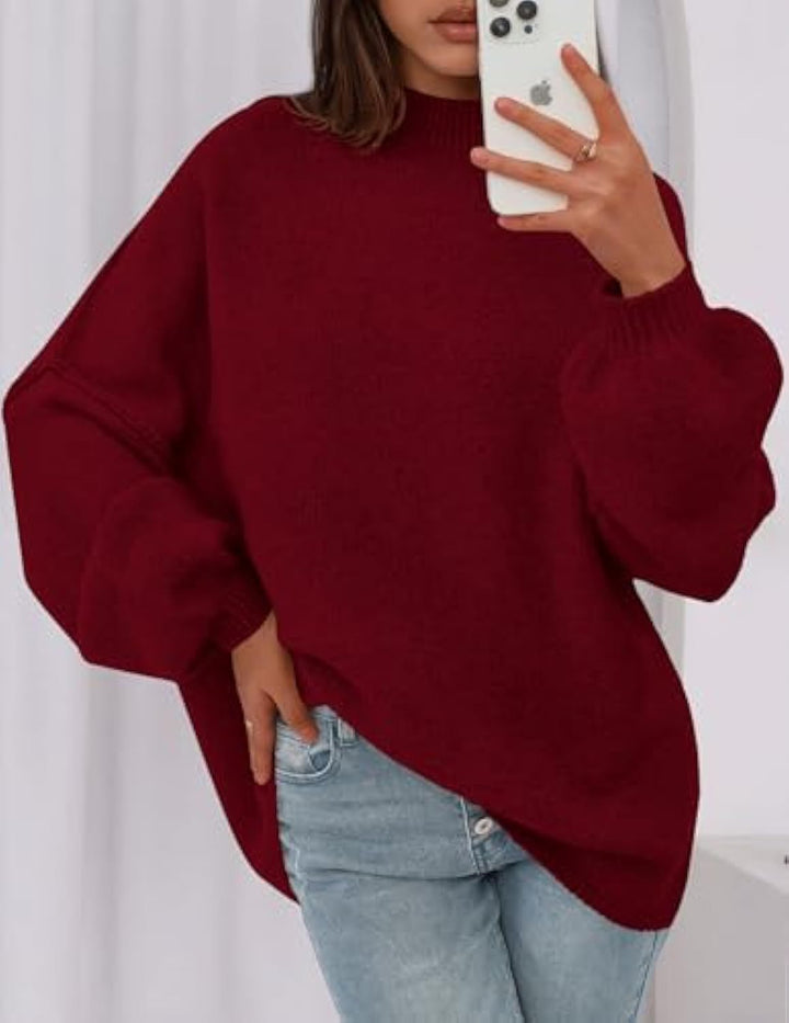 Ladies oversized knitted pullover with stand-up collar and balloon sleeves Drune
