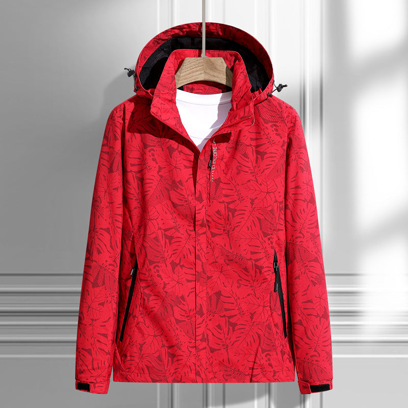 Women's lightweight packable rain and wind jacket with hood, leaf pattern and concealed zippers Mune Fashion