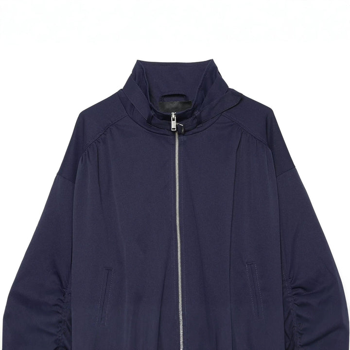 Women's cropped blouson with high stand-up collar, voluminous gathered sleeves and metal zipper Drune