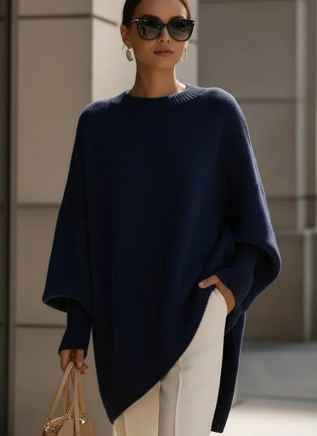 Women's oversized knit poncho with asymmetrical hem and ribbed sleeves Mune Fashion