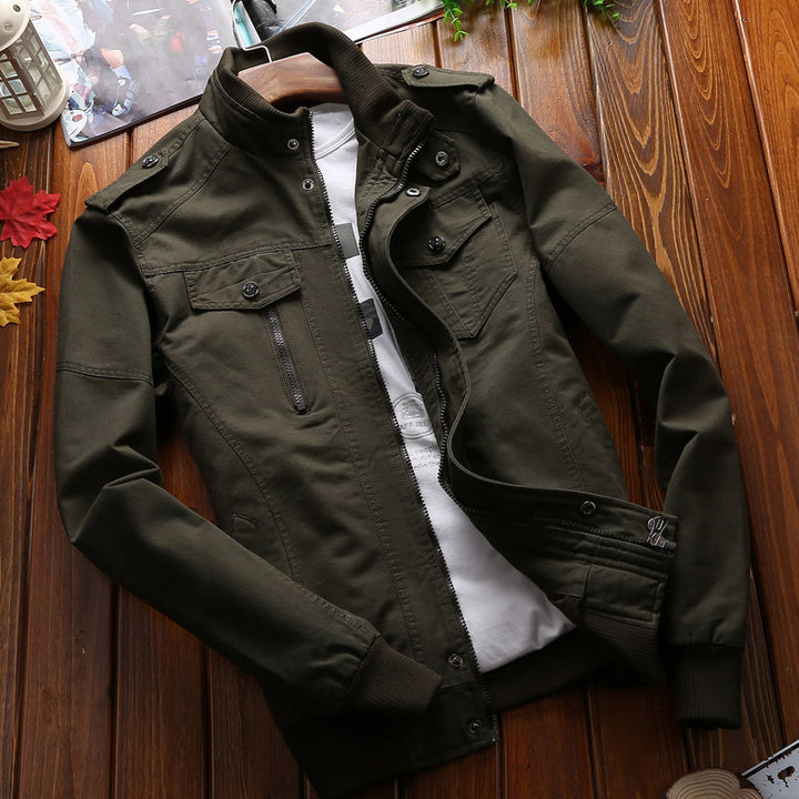 Men's lightweight canvas utility jacket with quilted lining, concealed two-way zipper, and elastic cuffs.