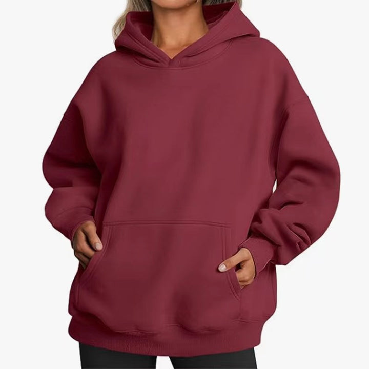 Women extra long oversized hoodie in boxy cut with kangaroo pocket and ribbed hem Mune Fashion