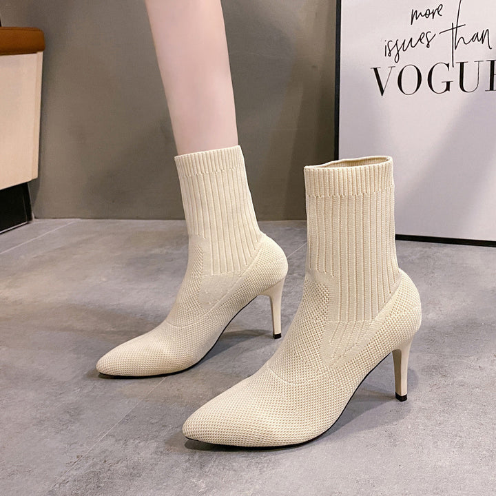Ladies' ankle boot in knit with contoured sock construction, slim stiletto heel and pointed toe cap Mune Fashion