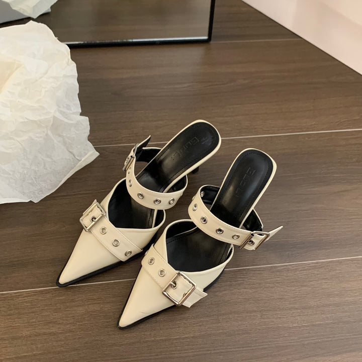 Women's pointed toe mule slippers with double buckle strap, eyelet detail, and low kitten heel Mune Fashion