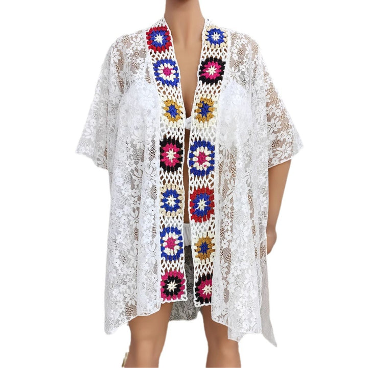 Women crocheted beach cover-up with colorful appliqués Mune Fashion