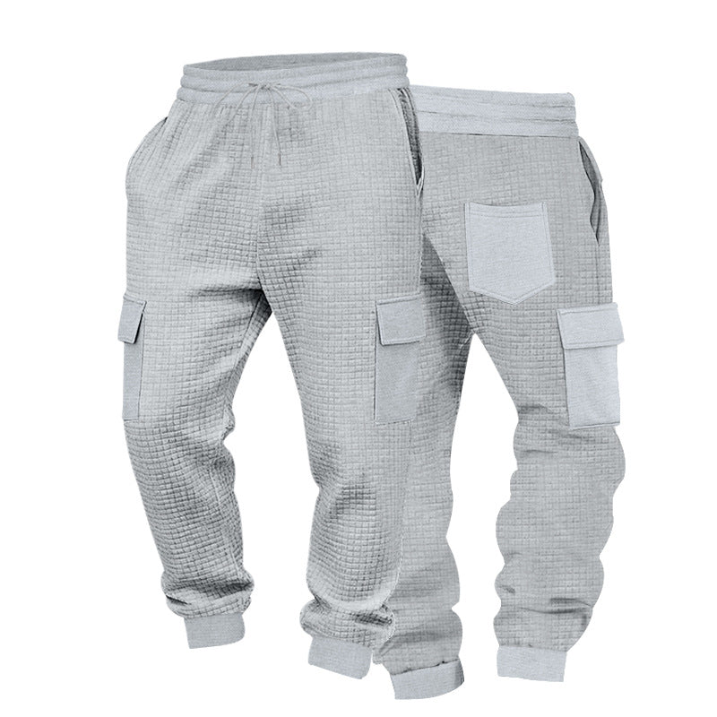 Men's cargo jogging pants with waffle texture, elastic waistband, and flap pockets Mune Fashion