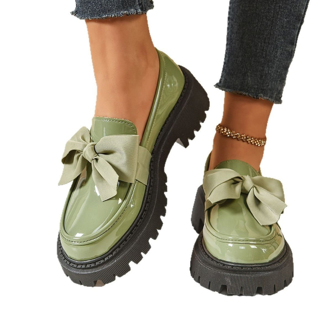 Ladies patent loafers with distinctive profile sole and decorative bow Mune Fashion