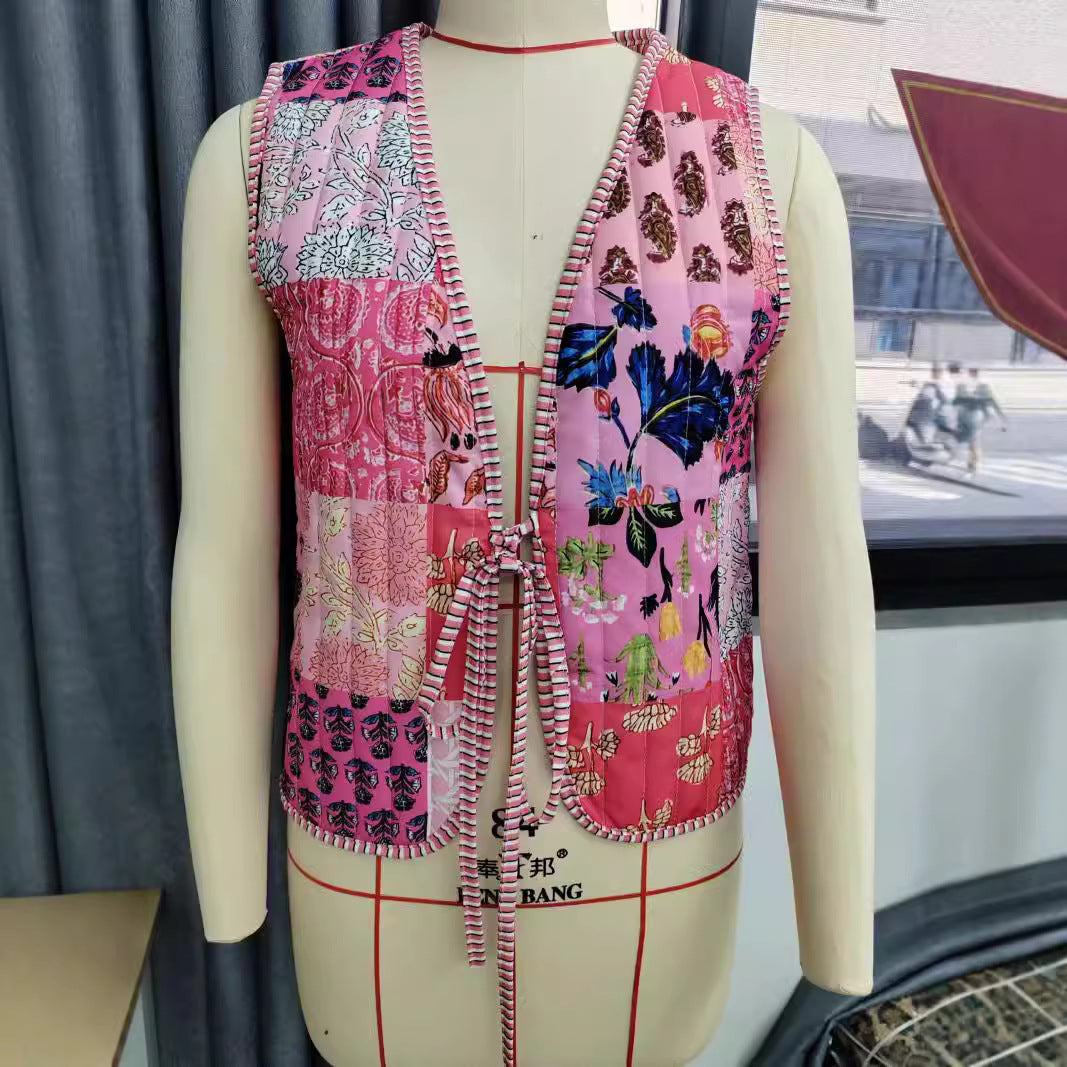 Ladies patchwork vest with tie belt, striped interior finish and contrast piping Mune Fashion