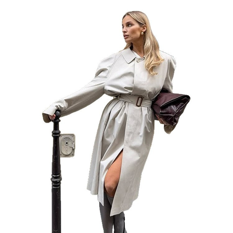Women's mid-length trench coat in cocoon cut with belt and raglan sleeves Mune Fashion