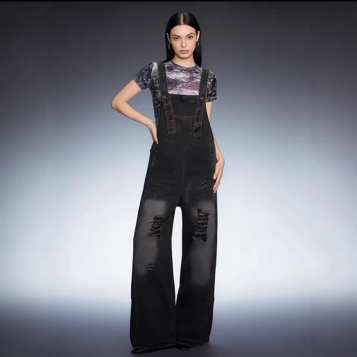 Women's modern baggy overalls made of pigment-dyed stretch denim with adjustable straps and visible rips Mune Fashion