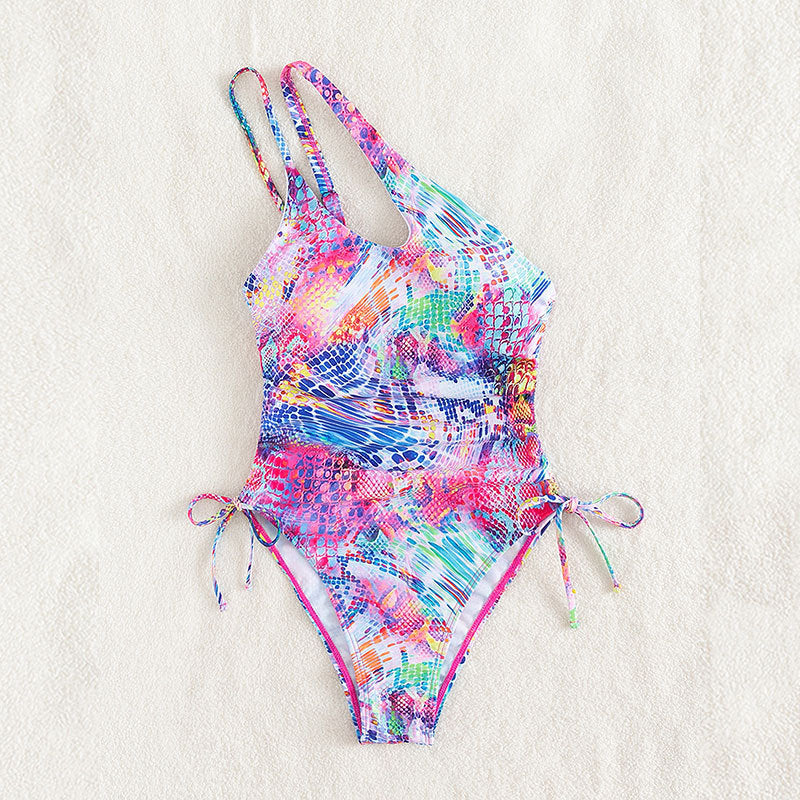 Women's asymmetrical cut-out swimsuit with side knots Mune Fashion