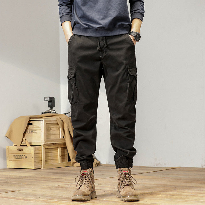Men's Tapered Cargo Jogger made of sturdy twill with drawstring waistband, flap pockets and ribbed ankles Mune Fashion