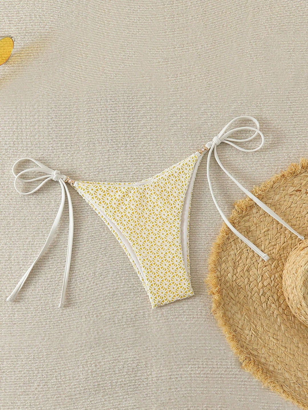 Women's bikini bottom with side ties and floral pattern Mune Fashion