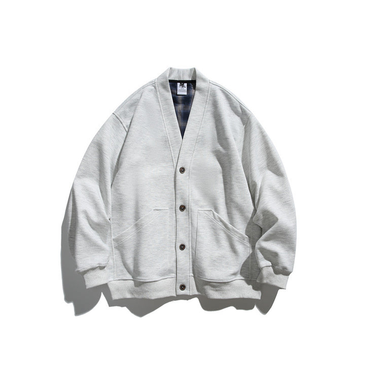 Unisex Oversized cardigan jacket made of heavyweight French terry with V-neck and patch pockets