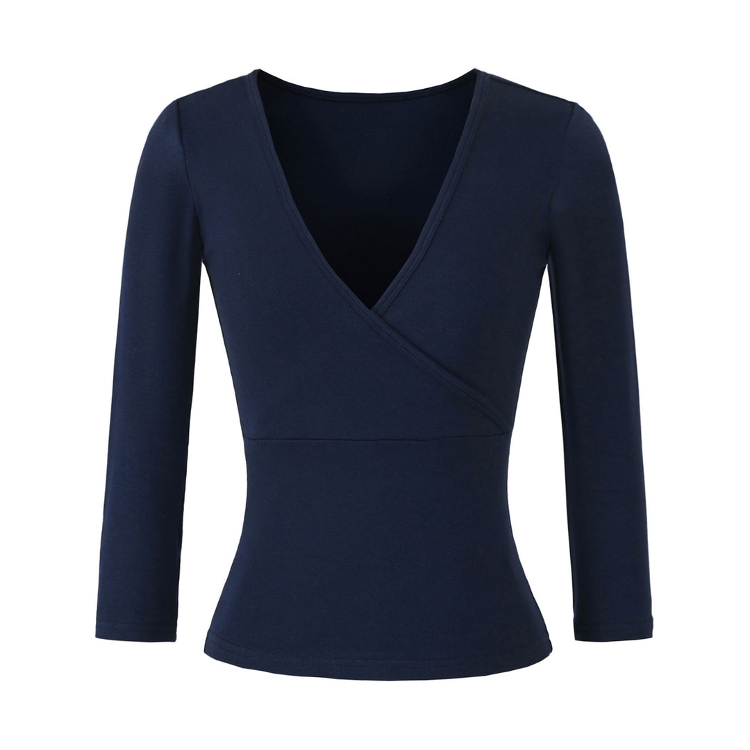 Women's figure-hugging wrap top made of stretch jersey with deep V-neck and tailored silhouette.
