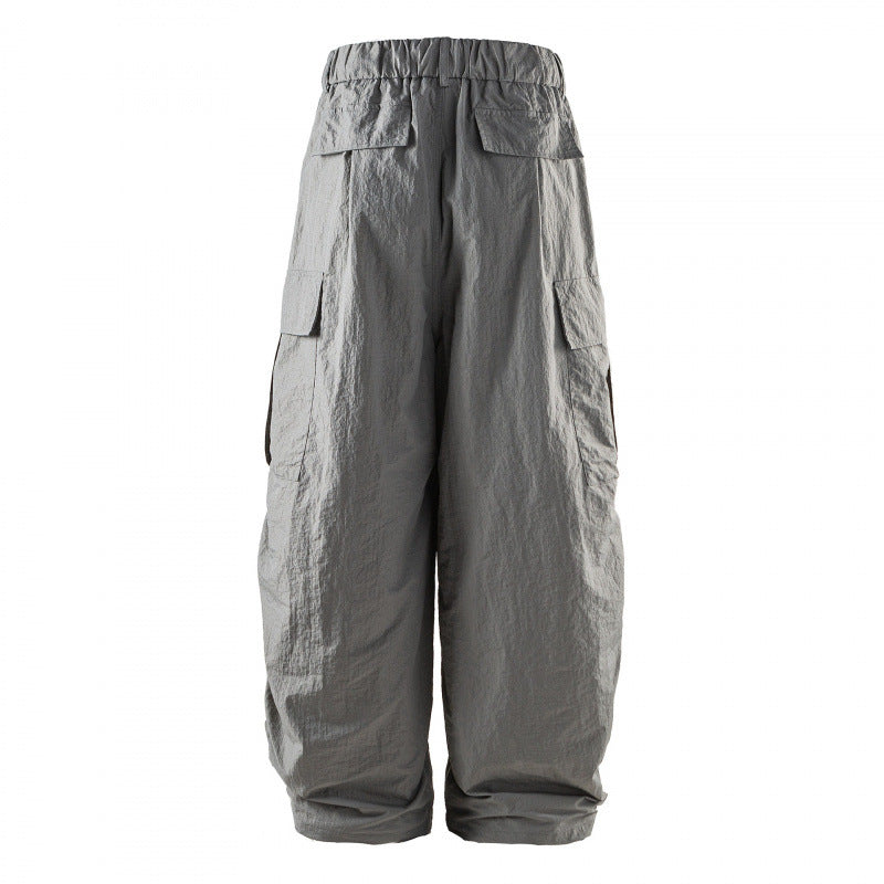 Unisex Wide Cropped Cargo Pants with Elastic Waistband, Drawstring and Overlay Pockets Mune Fashion