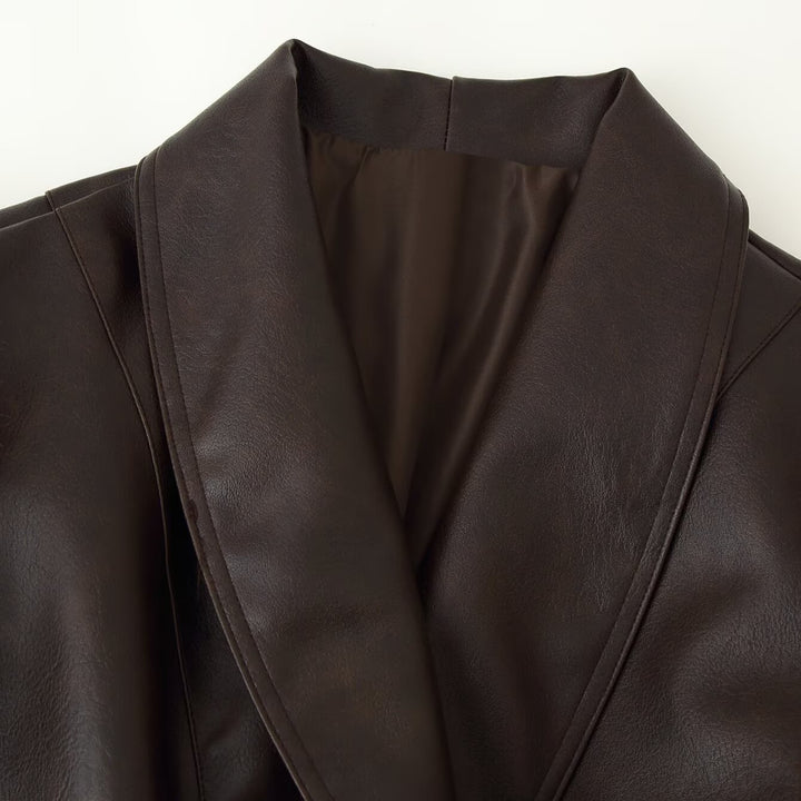 Women short jacket made of faux leather with long faux fur sleeves and tie belt Mune Fashion