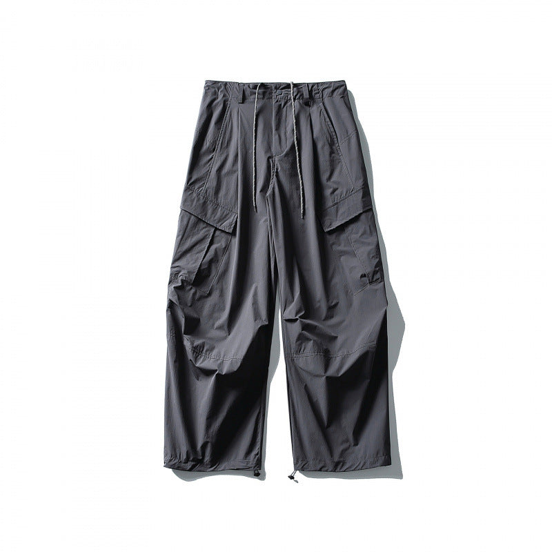 Men's loose technical cargo pants with drawstring waistband and adjustable leg closures Mune Fashion