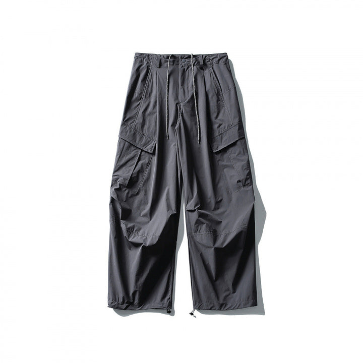 Men's loose technical cargo pants with drawstring waistband and adjustable leg closures Mune Fashion