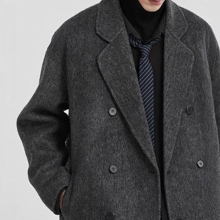 Men's oversized double-breasted wool coat with notched lapels and patch pockets Mune Fashion