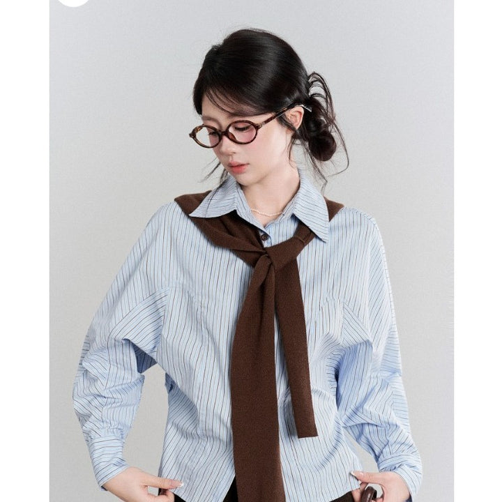 Women's oversized shirt blouse with fine pinstripes, wide sleeves, and casual hem Mune Fashion