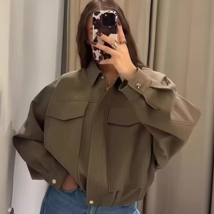 Women's oversized short utility blouson jacket with shirt collar, large patch pockets, and tailored cuffs Mune Fashion