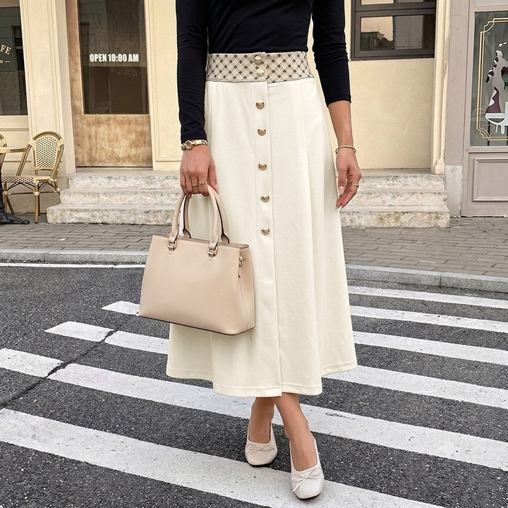 Women's midi skirt with high waist, decorative button placket and feminine A-line