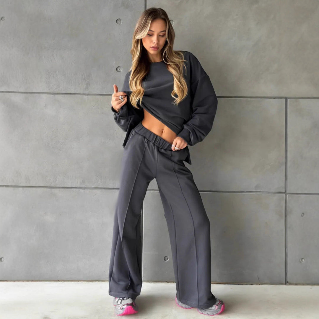 Women elegant lounge two-piece set with oversized sweatshirt and fitted wide-leg trousers Mune Fashion