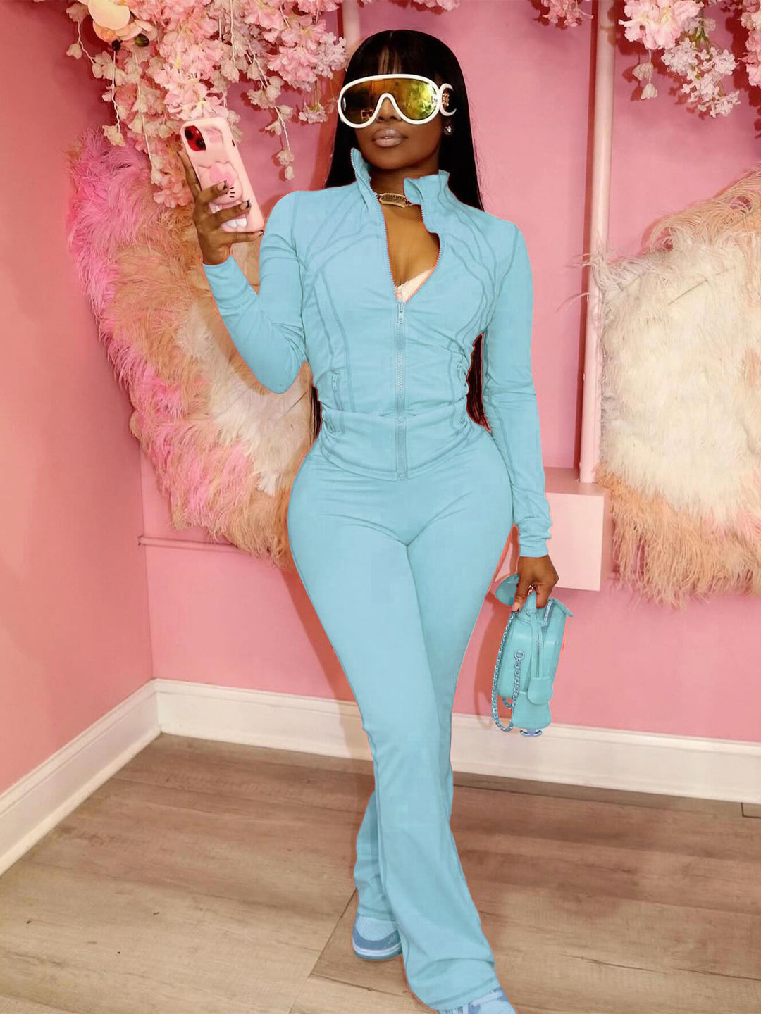Women's figure-hugging tracksuit with zipper, high waist and flared leg Mune Fashion
