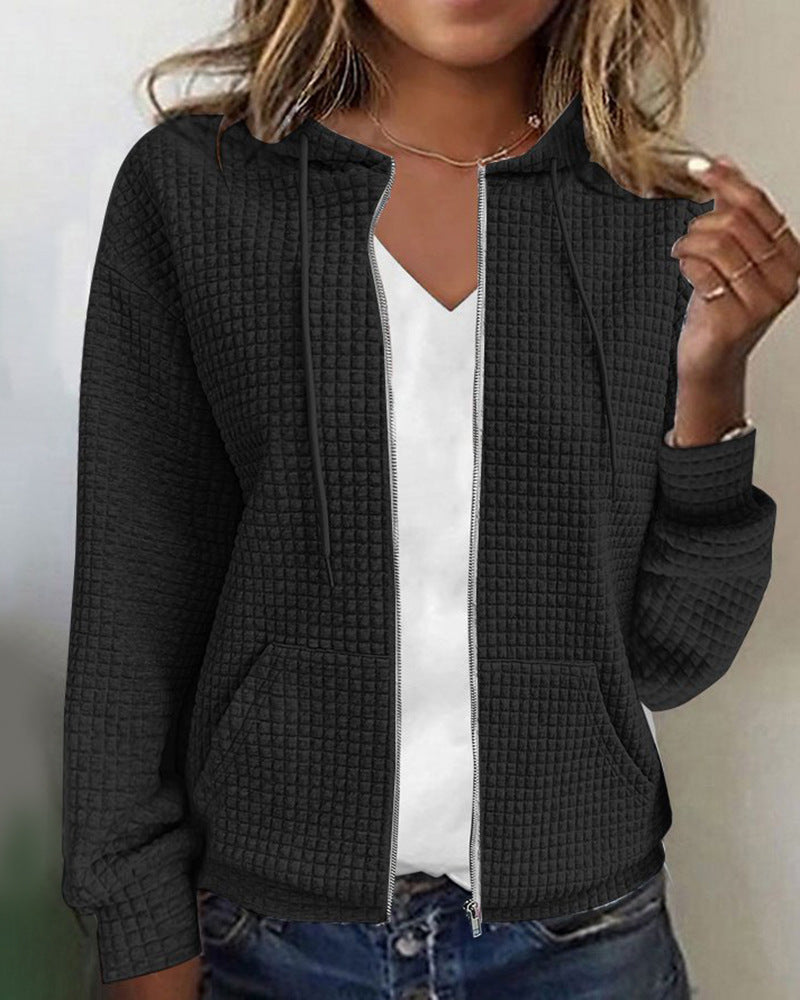 Women's quilted hooded jacket with waffle texture, full zip and kangaroo pockets Mune Fashion