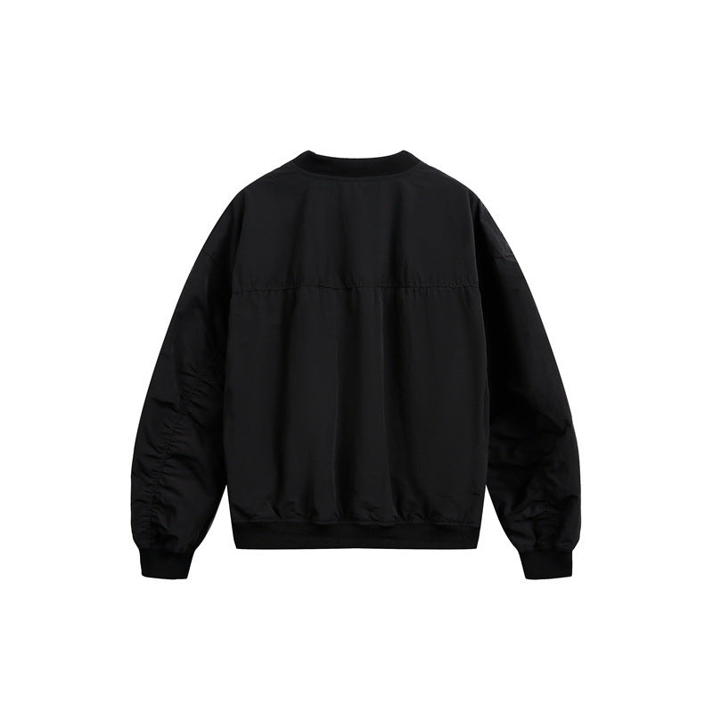 Unisex short cut lightweight nylon bomber jacket with utility pockets and ribbed hem Mune Fashion