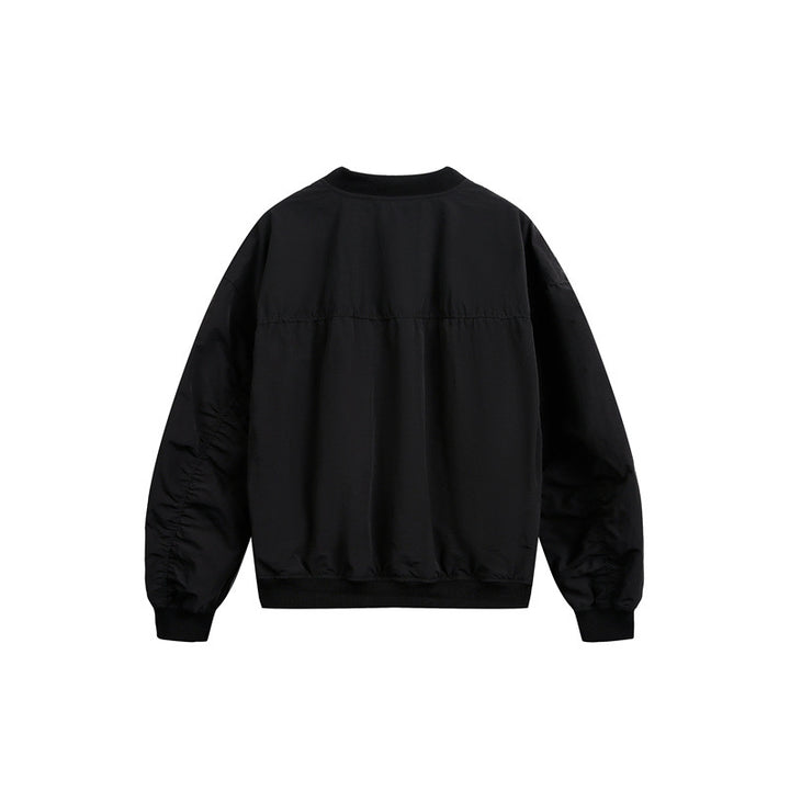 Unisex short cut lightweight nylon bomber jacket with utility pockets and ribbed hem Mune Fashion