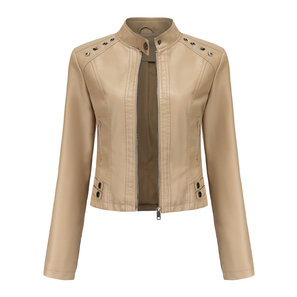 Women's short fitted faux leather jacket with studded detailing and stand-up collar Mune Fashion
