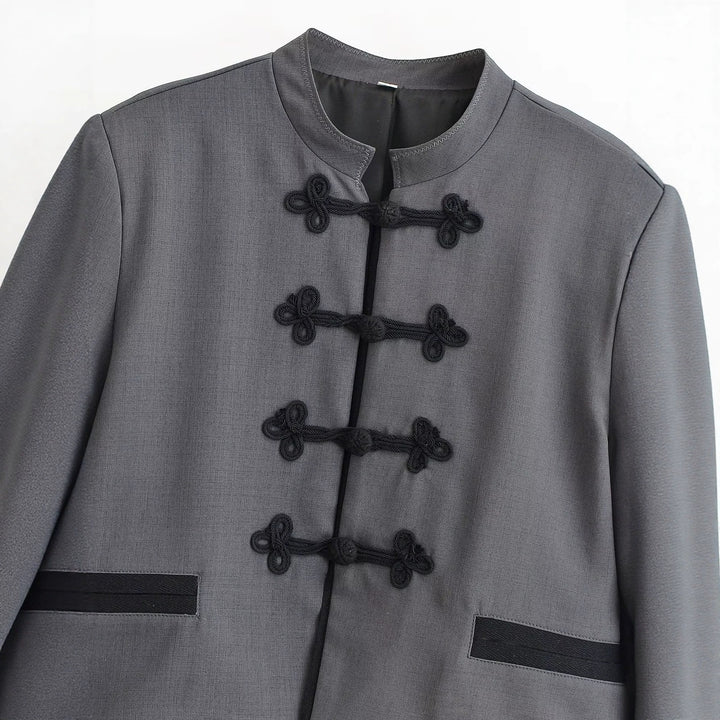 Women's short jacket with stand-up collar, decorative frog closures and boxy cut Mune Fashion