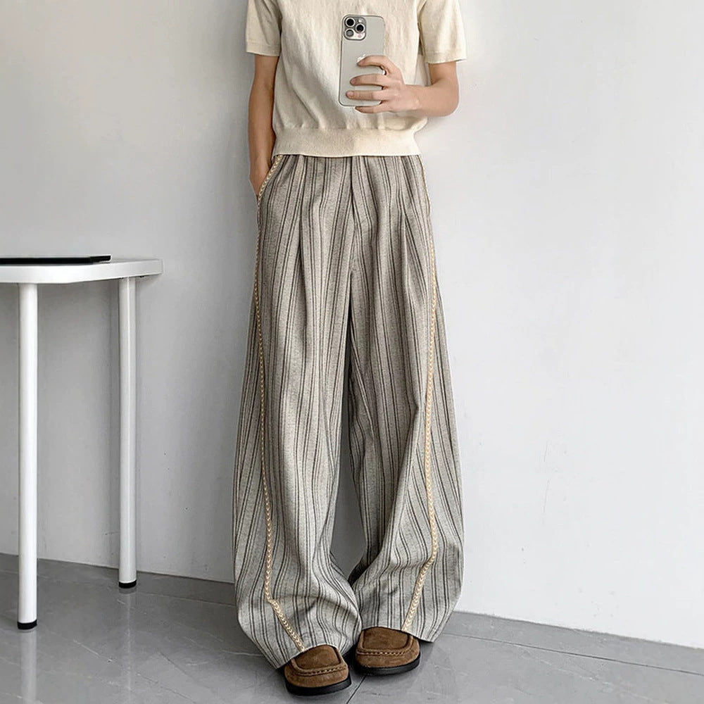 Men's loose baggy trousers in suit look with fine pinstripe and braided side piping Mune Fashion