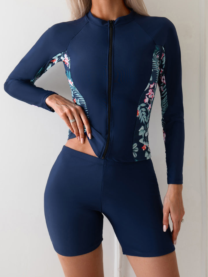 Women’s surf suit with long sleeves and floral accents Mune Fashion