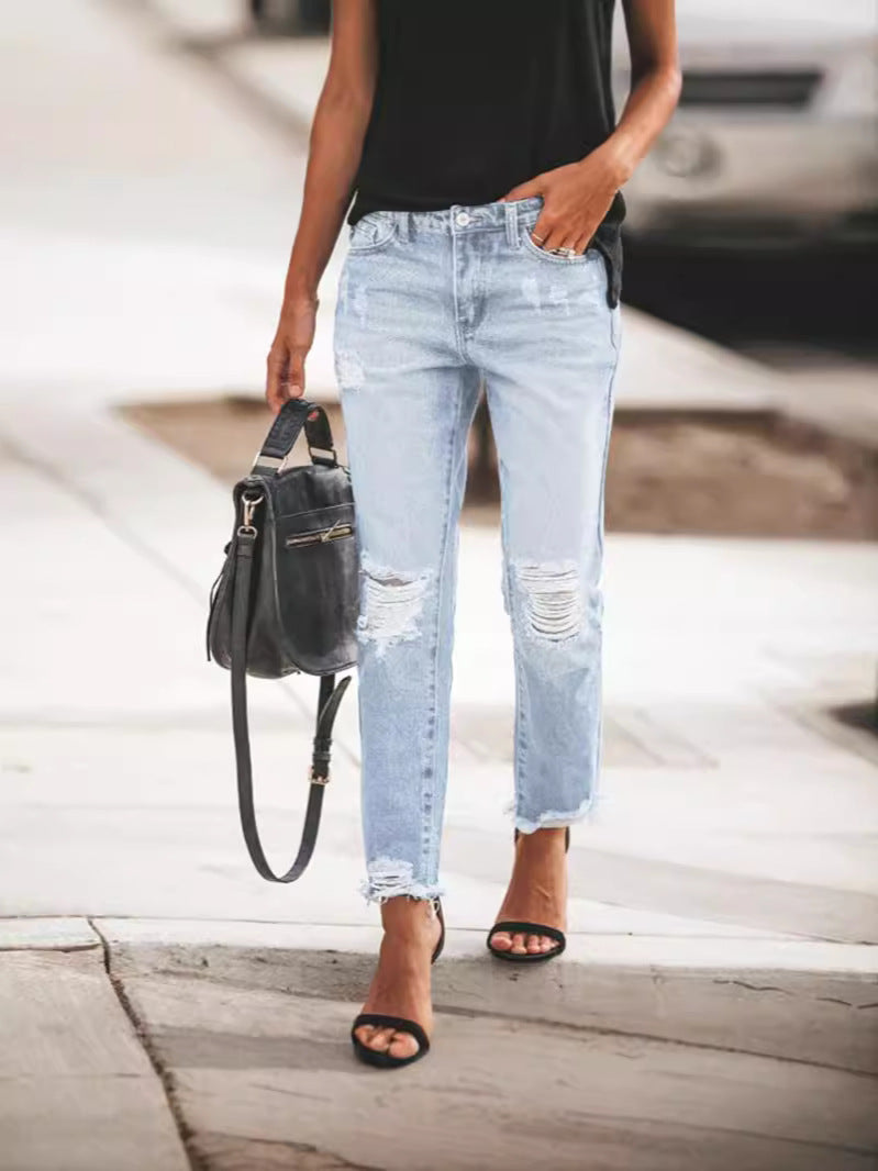 Women's Ripped Denim Jeans with Casual Cut and Frayed Hem Mune Fashion